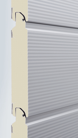 HS 7030 PU : cette porte à enroulement conçue par Hörmann, est équipée d'une barrière photoélectrique de sécurité directement intégrée au cadre dormant, et livrée en aluminium blanc RAL 9006.