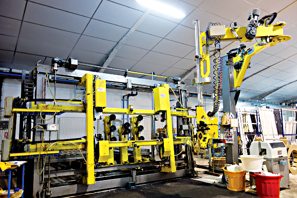 ... système automatisé pour vitrage et emballage des vantaux des coulissants aluminium ©Castes Industries